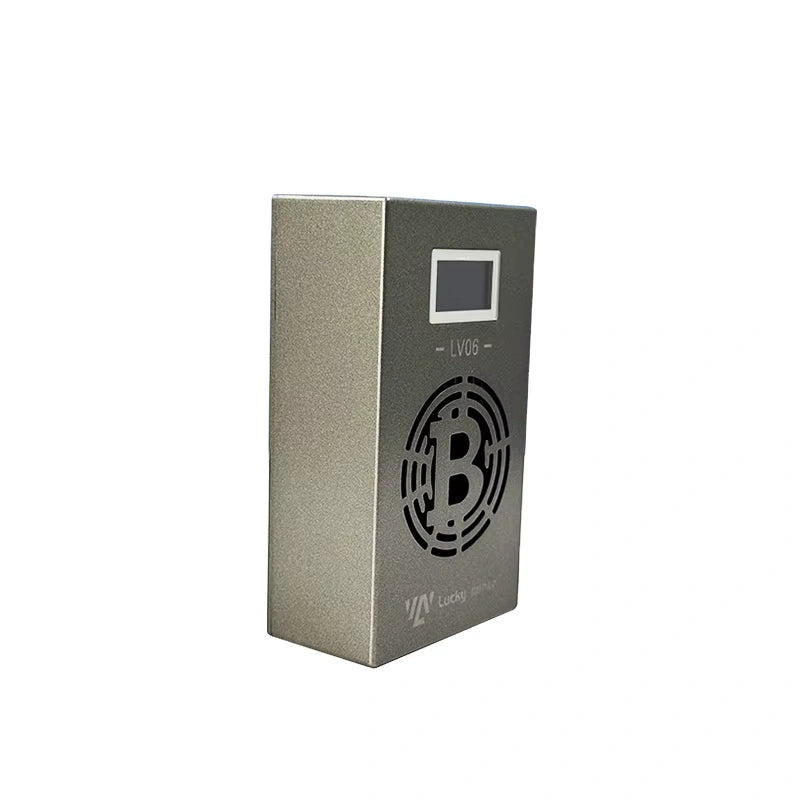A silver-colored ASIC miner named Lucky Miner LV06 is shown from a slight angle, displaying a digital screen and a Bitcoin logo cutout on its front. The sleek design emphasizes its modern technology for cryptocurrency mining.