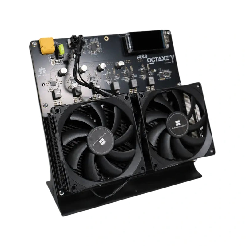 The image shows the NerdOCTAXE open-source Bitcoin miner, featuring a black circuit board with multiple components, including two large cooling fans and a display screen.